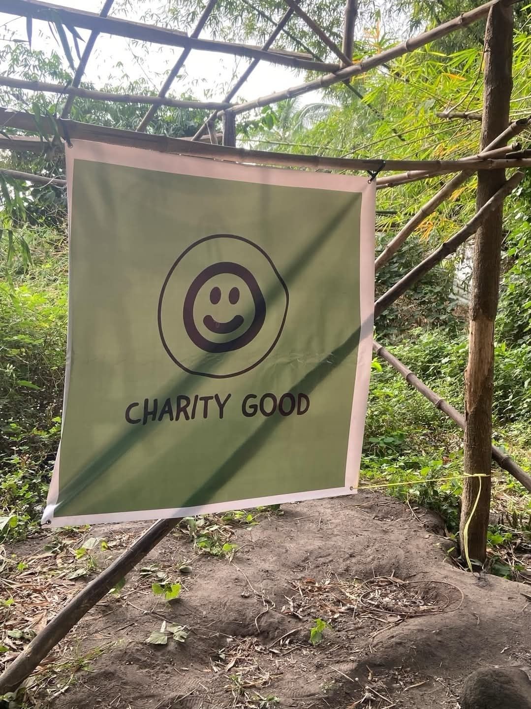 A Charity Good banner at a distribution point.