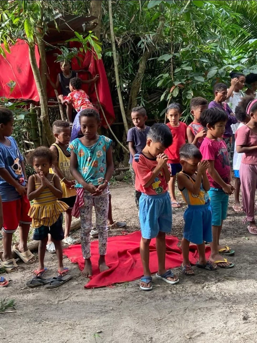 Children gathering at a community distribution.